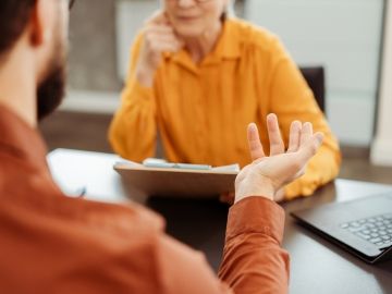 Two people talking to each other.