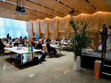 Speakers address participants at IDEA Symposium