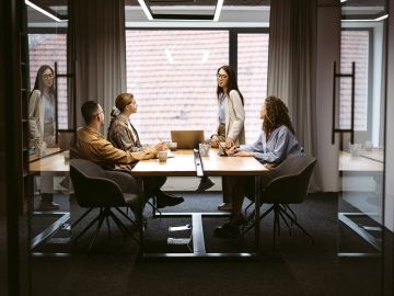 Workers in a business meeting.