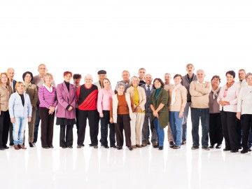 A large group of seniors looking at camera