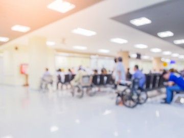 A blurry image of a hospital waiting room