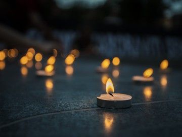 tea light candles lit in the night