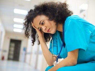 worried nurse in hospital hallway Thumbnail