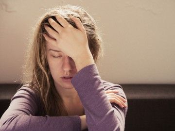 young_woman_pain_fatigue Thumbnail