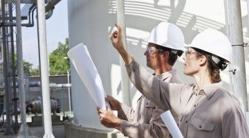 Two colleagues at an industrial plant 