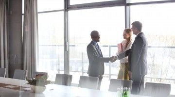 Colleagues shake hands