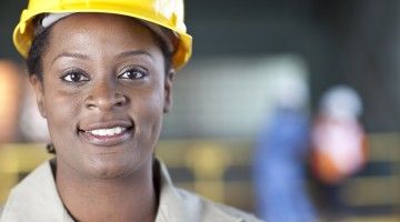 Close-up of a woman in a hard hat