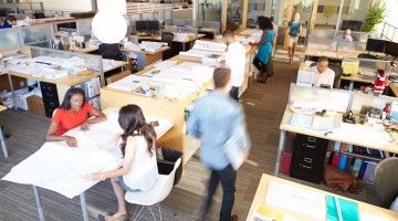 Overhead image of a busy, open-concept office