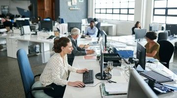 People working with computers at the office