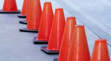 A row of orange safety cones
