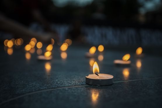 tea light candles lit in the night