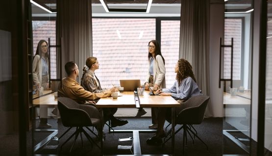 Workers in a business meeting.