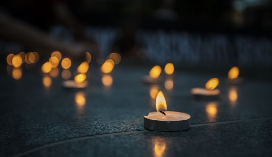 tea light candles lit in the night