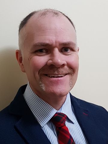 Photo of Greg McIntosh
